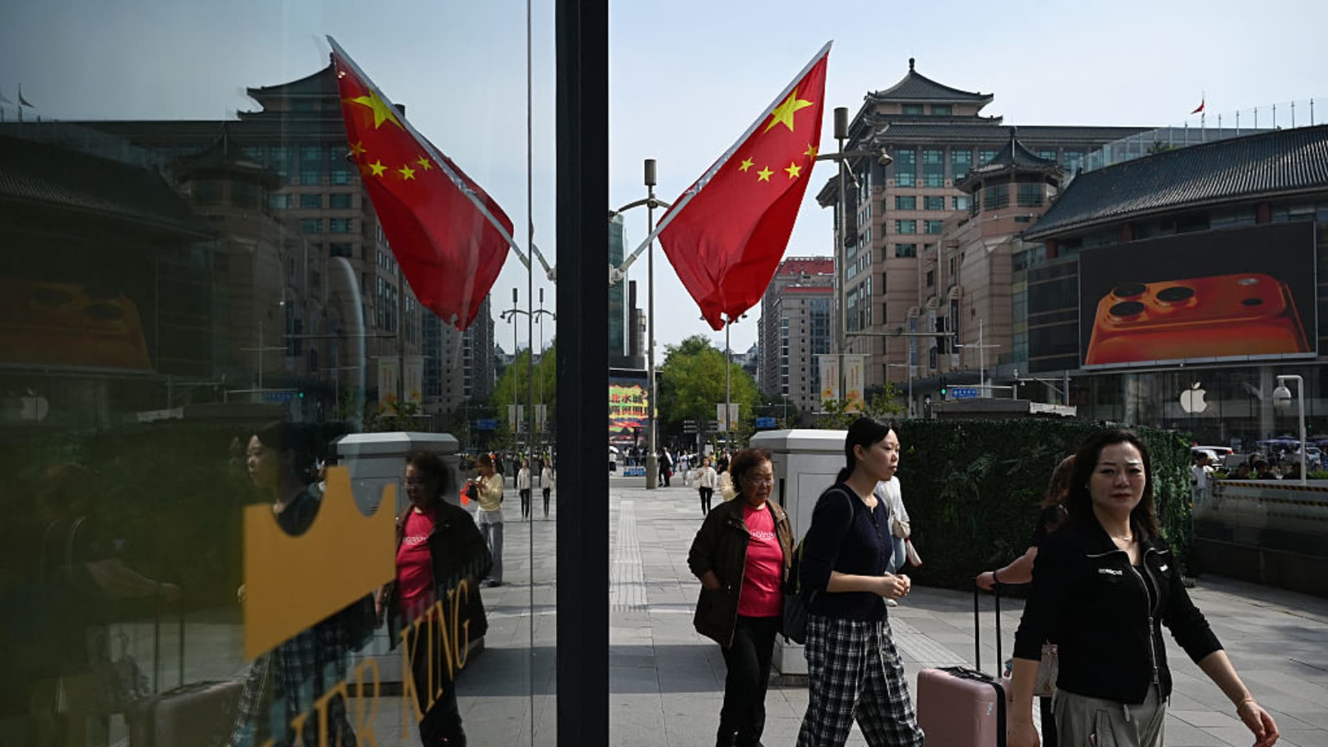 China economic growth accelerates to 5% in first quarter, beating expectations